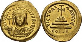 Tiberius II Constantine (578-582). AV Solidus, Constantinople mint, officina E. Bust facing, crowned, wearing consular robe and holding globus crucige...