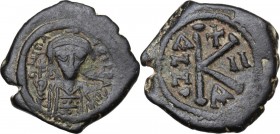 Maurice Tiberius (582-602). AE Half Follis. Constantinople mint, officina A. Dated RY II. Bust facing, wearing crown and loros, and holding globus cru...