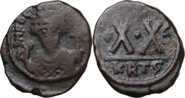 Phocas (602-610). AE Half Follis. Carthage mint. Dated RY E. Crowned bust facing, holding mappa and long cross. / Large X·X; star to left, cross above...