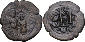 Heraclius, with Heraclius Constantine (610-641). AE Follis. Nicomedia mint, 2nd officina. Dated RY 4 (613/4). Heraclius and Heraclius Constantine stan...
