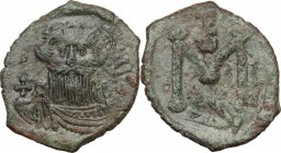 Constans II (641-668). AE Follis, Syracuse mint, 650-651. Crowned and draped bust facing, holding globus cruciger. / Large M; monogram above, SCL in e...