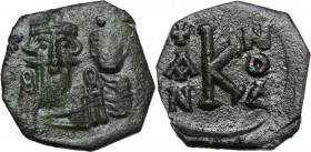 Constans II, with Constantine IV (641-668). AE Half Follis. Syracuse mint. Dated IY 4 (AD 664/5). Crowned facing busts of Constans II, holding globus ...