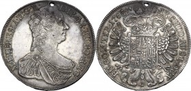 Austria. Maria Theresia (1740-1780). AR Taler 1765, Hall mint. Dav. 1122; Herinek 470. AR. 28.07 g. 41.00 mm. Scarce. Holed. Fields smoothed. Good VF.