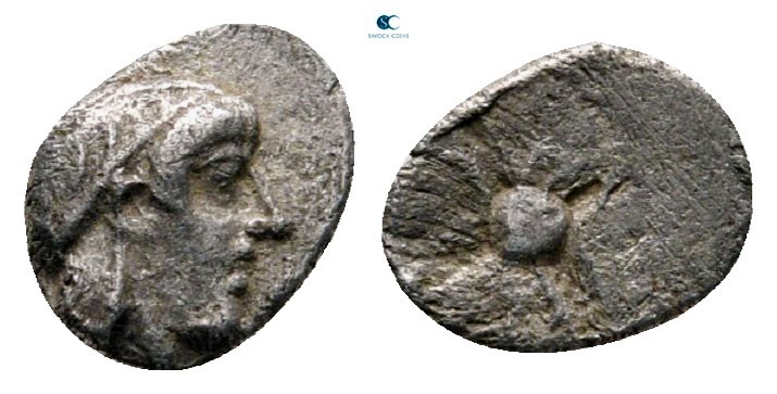 Ionia. Kolophon circa 450-410 BC. 
Hemiobol AR

7 mm, 0,27 g

Laureate head...