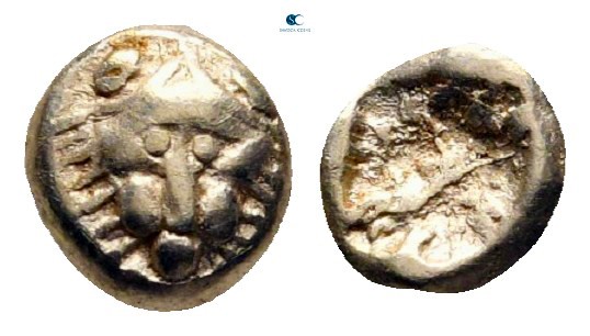 Ionia. Miletos circa 600-546 BC. 
1/24 Stater EL

5 mm, 0,58 g

Head of lio...