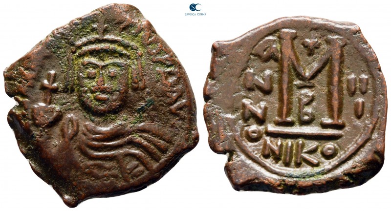 Heraclius AD 610-641. Nikomedia
Follis or 40 Nummi Æ

31 mm, 11,28 g

Helme...