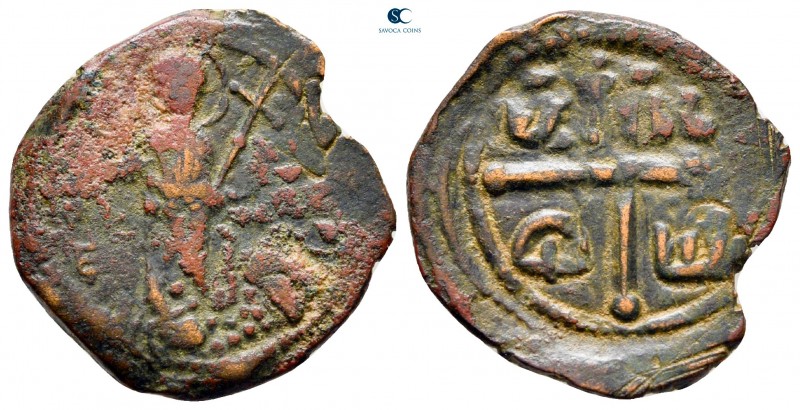Tancred AD 1101-1103. Antioch
Follis Æ

23 mm, 4,18 g

St. Peter standing f...