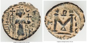 Pair of Uncertified Arab-Byzantine Fulus VF, 1) Anonymous Fals ND (c. 660-690), Hims (Emesa) mint, A-3516, DOCAB-40. Standing Imperial Figure type. 2)...