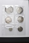 LOTTI
Lotto di 15 monete e medaglie papali: si segnalano una Piastra e n. 3 mezze piastre
Molte con appiccagnolo. Interessante