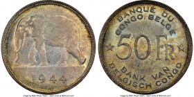 Belgian Colony 50 Francs 1944 MS63 NGC, KM27. Denomination at center, stars flanking, legend at top and bottom / African elephant left, date below. A ...