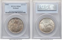Republic 1/2 Crown 1942 MS66 PCGS, London mint, KM16. Well-struck and displaying slightly dappled iridescent blue and golden tone over satiny surfaces...