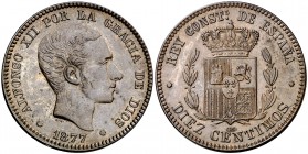 1877. Alfonso XII. Barcelona. OM. 10 céntimos. (Cal. 67). 9,95 g. EBC-.