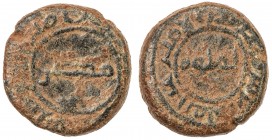 UMAYYAD: AE fals (6.35g), Fayyum, ND, A-149, in the name of the financial governor of Egypt, 'Abd al-Malik b. Marwan, with misr in the obverse center,...