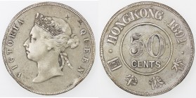 CHOPMARKED COINS: HONG KONG: Victoria, 1840-1901, AR 50 cents, 1891, KM-9.1, with two small Chinese merchant chopmarks above portrait, several rim bum...