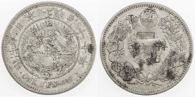 CHOPMARKED COINS: JAPAN: Meiji, 1868-1912, AR yen, year 17 (1884), Y-A25.2, large Chinese merchant chopmarks and single assay chop, VF, ex D. R. Bain ...
