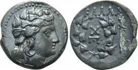 MOESIA. Kallatis. Ae (3rd-2nd centuries BC). 

Obv: Head of Dionysos right, wearing ivy wreath.
Rev: KAΛΛA. 
Monogram and E within wreath; thyrsos...
