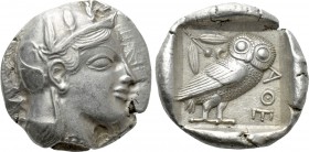 ATTICA. Athens. Tetradrachm (Circa 465-460 BC). Transitional issue.

Obv: Helmeted head of Athena right, with frontal eye.
Rev: AΘE.
Owl standing ...