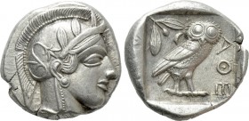 ATTICA. Athens. Tetradrachm (Circa 454-404 BC).

Obv: Helmeted head of Athena right, with frontal eye.
Rev: AΘE.
Owl standing right, head facing; ...