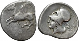 CORINTHIA. Corinth. Stater (Circa 400-375 BC). 

Obv: Pegasos flying left; koppa below.
Rev: Helmeted head of Athena left; palmette behind.

Pega...