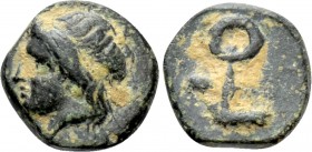 ASIA MINOR. Uncertain. Ae (4th-3rd centuries).. 

Obv: Laureate head of Apollo(?) left.
Rev: Key or hook-like symbol.

Unpublished in the standar...