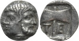 TROAS. Tenedos. Obol (Late 5th-early 4th centuries BC). 

Obv: Janiform head of a diademed female left and laureate male right.
Rev: T - E. 
Labry...