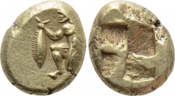 MYSIA. Kyzikos. EL Hekte (Circa 500-450 BC). 

Obv: Satyr kneeling left, holding in his extended right hand a tunny fish by the tail.
Rev: Quadripa...