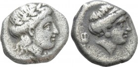 LESBOS. Mytilene. Diobol (Circa 400-350 BC). 

Obv: Laureate head of Apollo right.
Rev: Female head (Aphrodite?) right; oinochoe behind.

BMC 11-...