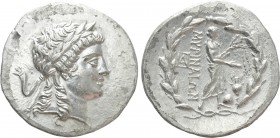 AEOLIS. Myrina. Tetradrachm (Circa 155-145 BC). Stephanophoric type. 

Obv: Laureate head of Apollo right.
Rev: MYPINAIΩN. 
Apollo Grynios standin...