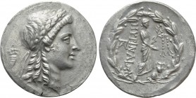 AEOLIS. Myrina. Tetradrachm (Circa 155-145 BC). Stephanophoric type.

Obv: Laureate head of Apollo right.
Rev: MYPINAIΩN.
Apollo Grynios standing ...