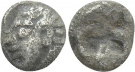 IONIA. Kolophon. Tetartemorion (Late 6th century BC). 

Obv: Archaic head of Apollo left.
Rev: Quadripartite incuse square.

SNG Kayhan I 343; SN...