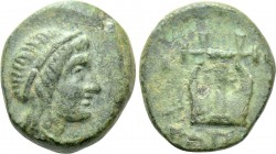 IONIA. Kolophon. Ae (Circa 330-285 BC). Pausanias, magistrate. 

Obv: Head of Apollo right, wearing tainia.
Rev: KO ΠAYΣANIAΣ. 
Lyre.

Milne, Co...