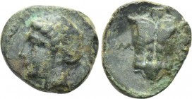 IONIA. Magnesia ad Maeandrum. Ae (Circa 400 BC). 

Obv: Laureate head of Apollo left.
Rev: M - A. 
Cuirass.

SNG Kayhan I 393-4; SNG Copenhagen ...
