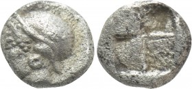 IONIA. Phokaia. Tetartemorion (Circa 521-478 BC). 

Obv: Archaic female head left, wearing earring and helmet or close fitting cap.
Rev: Quadripart...
