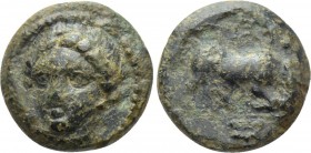 IONIA. Phygela. Ae (Circa 350-300 BC). 

Obv: Head of Artemis Munychia facing slightly left.
Rev: ΦΥ. 
Bull butting right; astragalos in exergue....