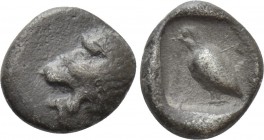 CARIA. Mylasa. Tetartemorion (Circa 420-390 BC). 

Obv: Forepart of lion right, head reverted.
Rev: Bird standing left.

SNG Kayhan 940-43 (Caria...