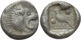 CARIA. Mylasa. Tetartemorion (Circa 420-390 BC). 

Obv: Forepart of lion left, head reverted.
Rev: Bird standing left; two pellets in field.

SNG...