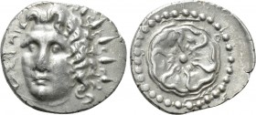 CARIA. Rhodes. Drachm (Circa 88/42 BC-AD 14). 

Obv: Radiate head of Helios facing slightly left.
Rev: P - O. 
Rose seen from above. Control: belo...