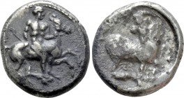 CILICIA. Kelenderis. Stater (Circa 410-375 BC). 

Obv: Youth, holding whip and reins, dismounting from horse rearing right.
Rev: ΚΕΛΕΝ. 
Goat knee...
