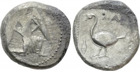 CILICIA. Mallos. Stater (Circa 440-390 BC). 

Obv: Winged male figure advancing right, holding solar disk.
Rev: ΜΑP. 
Swan standing left; grain ea...