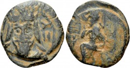 KINGS OF PARTHIA. Vologases III (105-147). Ae. Seleukeia on the Tigris. 

Obv: Facing bust, wearing tiara with ear flaps.
Rev: Tyche seated left; p...