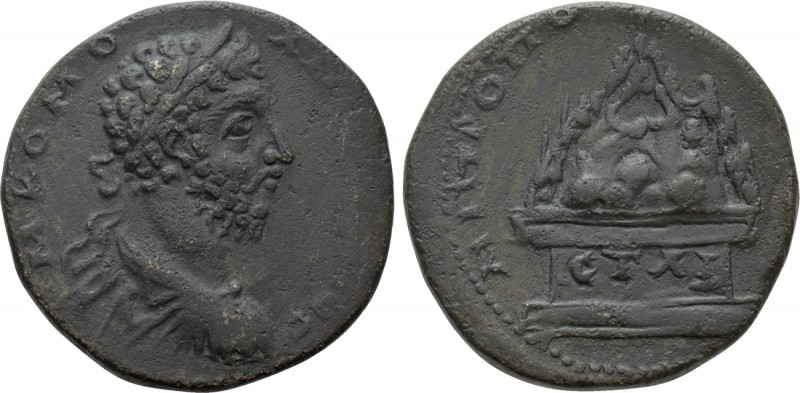 CAPPADOCIA. Caesarea. Commodus (177-192). Ae. Dated RY 11 (190). 

Obv: M KOMO...