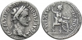 TIBERIUS (14-37). Denarius. Lugdunum. "Tribute Penny" type. 

Obv: TI CAESAR DIVI AVG F AVGVSTVS. 
Laureate head right.
Rev: PONTIF MAXIM. 
Livia...