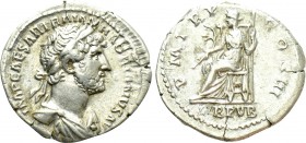 HADRIAN (117-138). Denarius. Rome. 

Obv: IMP CAESAR TRAIAN HADRIANVS AVG. 
Laureate and draped bust right.
Rev: P M TR P COS III / LIB PVB. 
Lib...