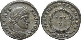 CRISPUS (Caesar, 316-326). Follis. Siscia. 

Obv: IVL CRISPVS NOB C. 
Laureate head right.
Rev: CAESARVM NOSTRORVM / ASIS (star). 
VOT / V in two...