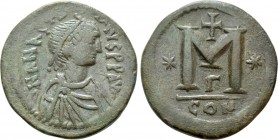 ANASTASIUS I (491-518). Follis. Constantinople. 

Obv: D N ANASTASIVS P P AVG. 
Diademed, draped and cuirassed bust right.
Rev: Large M; star to l...