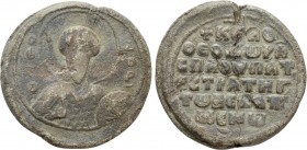 BYZANTINE LEAD SEALS. Theodoros Bebaptismenos, spatharios, hypatos and strategos (Circa 11th century). 

Obv: Θ/Є/O-Δ/ω/P. 
Nimbate facing bust of ...