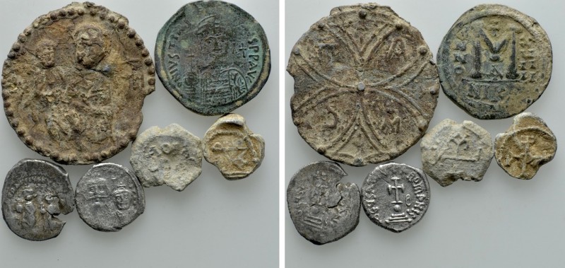 6 Byzantine Coins and Seals. 

Obv: .
Rev: .

. 

Condition: See picture....