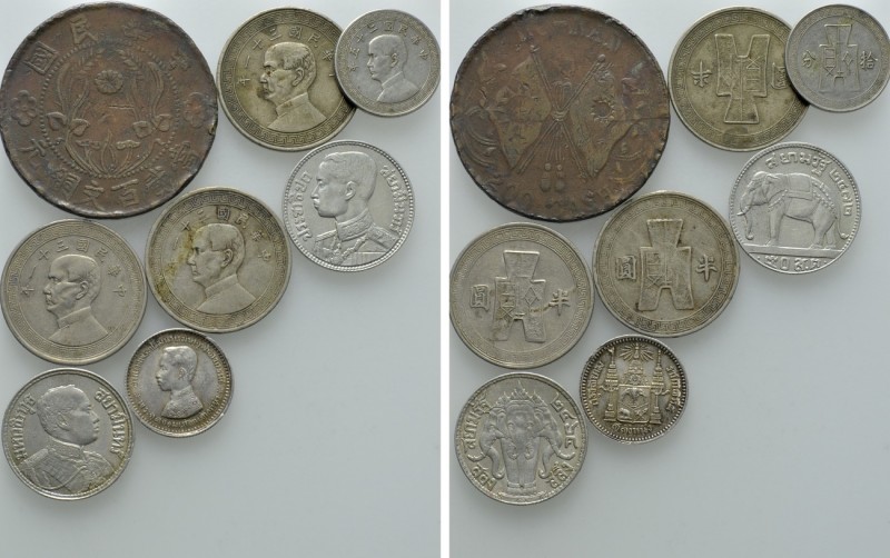 8 Coins of China and Thailand. 

Obv: .
Rev: .

. 

Condition: See pictur...
