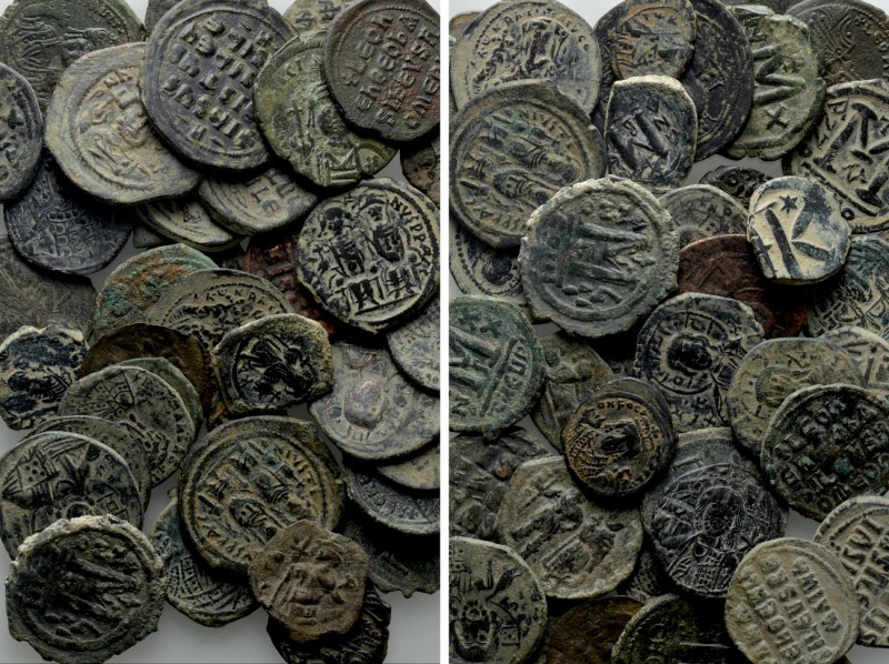 Circa 40 Byzantine Coins. 

Obv: .
Rev: .

. 

Condition: See picture.
...
