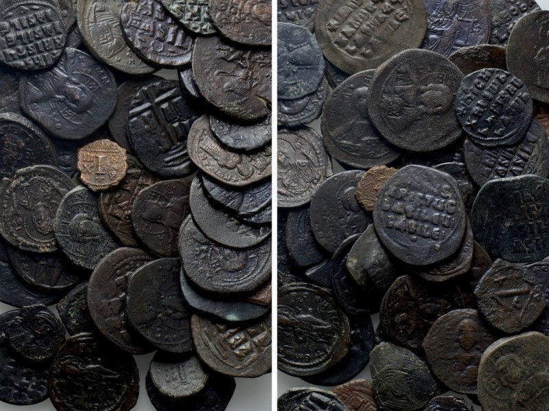 Circa 48 Byzantine Coins. 

Obv: .
Rev: .

. 

Condition: See picture.
...